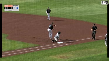 Chase Burns picks off the runner at first