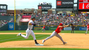 Jordan Beck hits an infield single after review