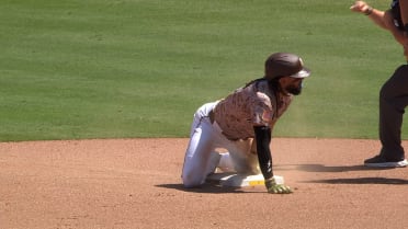 J.T. Realmuto nabs Fernando Tatis Jr. after review