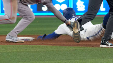 George Springer steals second base after review