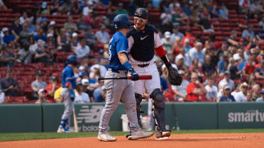 Jansen and Varsho embrace at home plate