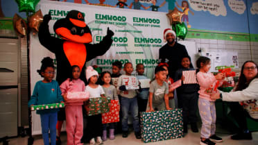 The Orioles deliver toys to a local elementary school