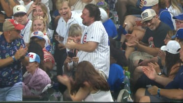 Cubs fan catches a foul ball