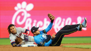 Adolis García throws out José Ramírez at second base