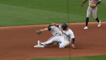 Ty France called out at second base after review 