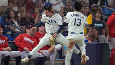Caminero and DeLuca collide, remain in game