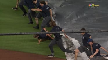Cubs grounds crew member swallowed up by tarp