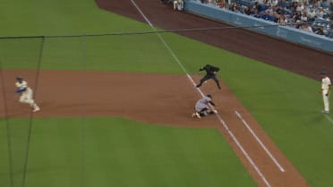 First base umpire dodges a Kyle Tucker foul ball