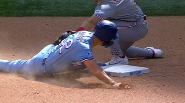Evan Carter steals second base in the 7th inning