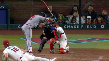 Daylen Lile is hit by a pitch following a review