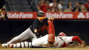 Luis Rengifo throws out Rivera at the plate 