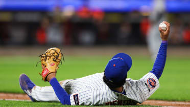 Zach McKinstry reaches on error after review