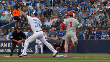 Bryce Harper safe at first base after challenge
