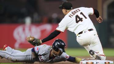 Giants turn double play after review
