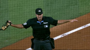 Otto Lopez hits an infield single after review