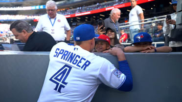 George Springer visits his kids after being taken out