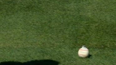 Cover is torn off the baseball after groundout