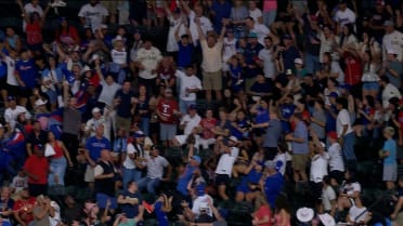 Fan catches Evan Carter's home run ball