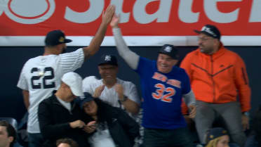 Knicks fans celebrate their win at the Yankees game