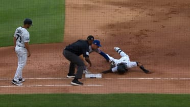 Miguel Vargas out at first, call stands