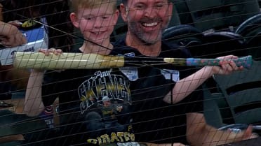 Young fan reacts to receiving bat