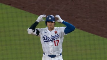 Shohei Ohtani is safe at first after review