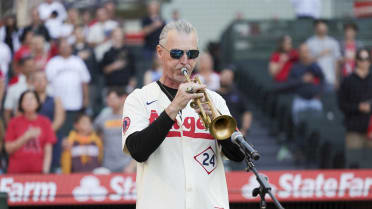 Survivor's Coach performs National Anthem