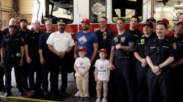 Kyle Schwarber visits Engine 49 fire department