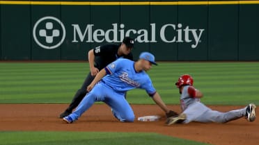 Bubba Thompson steals second base after review
