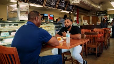 Ken Griffey Jr. visits with Junior Caminero