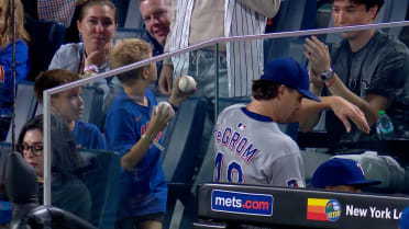 Jacob deGrom gives fan ball, gives it to another fan