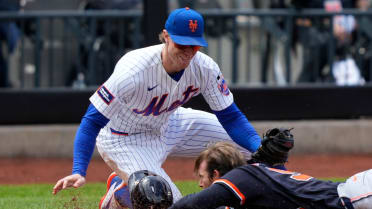 MJ Melendez gets the out at third after challenge