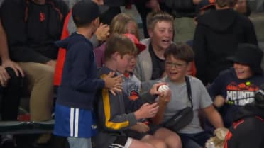 Young Giants fan catches ball