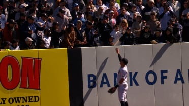 Aaron Judge gives a fan a ball on Opening Day