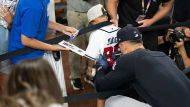 Aaron Judge signs young fan's Team USA jersey