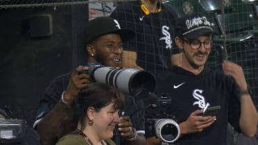Tim Anderson takes some photos of the game