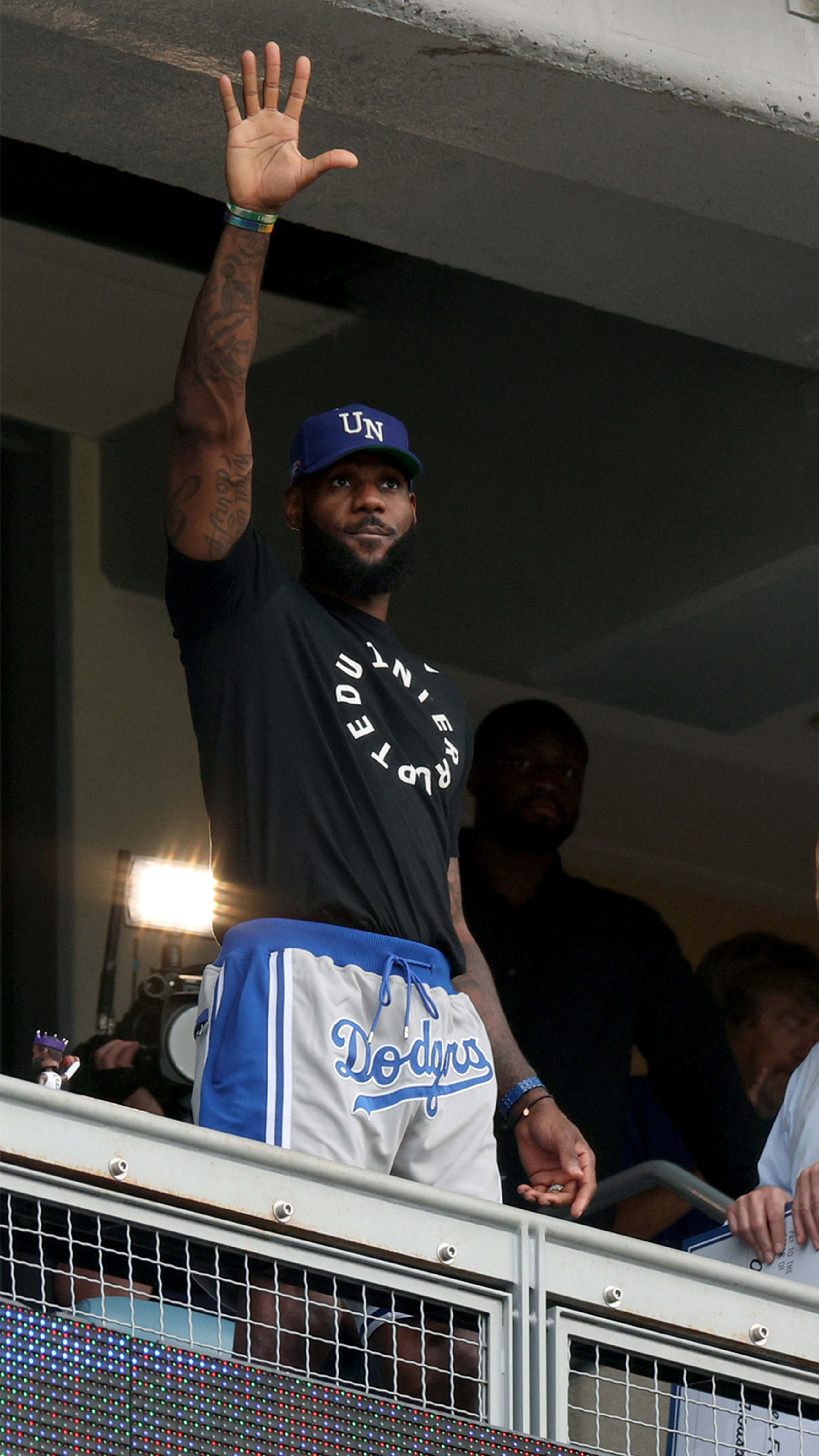 MLB Stories - LeBron, pro athletes wearing MLB swag