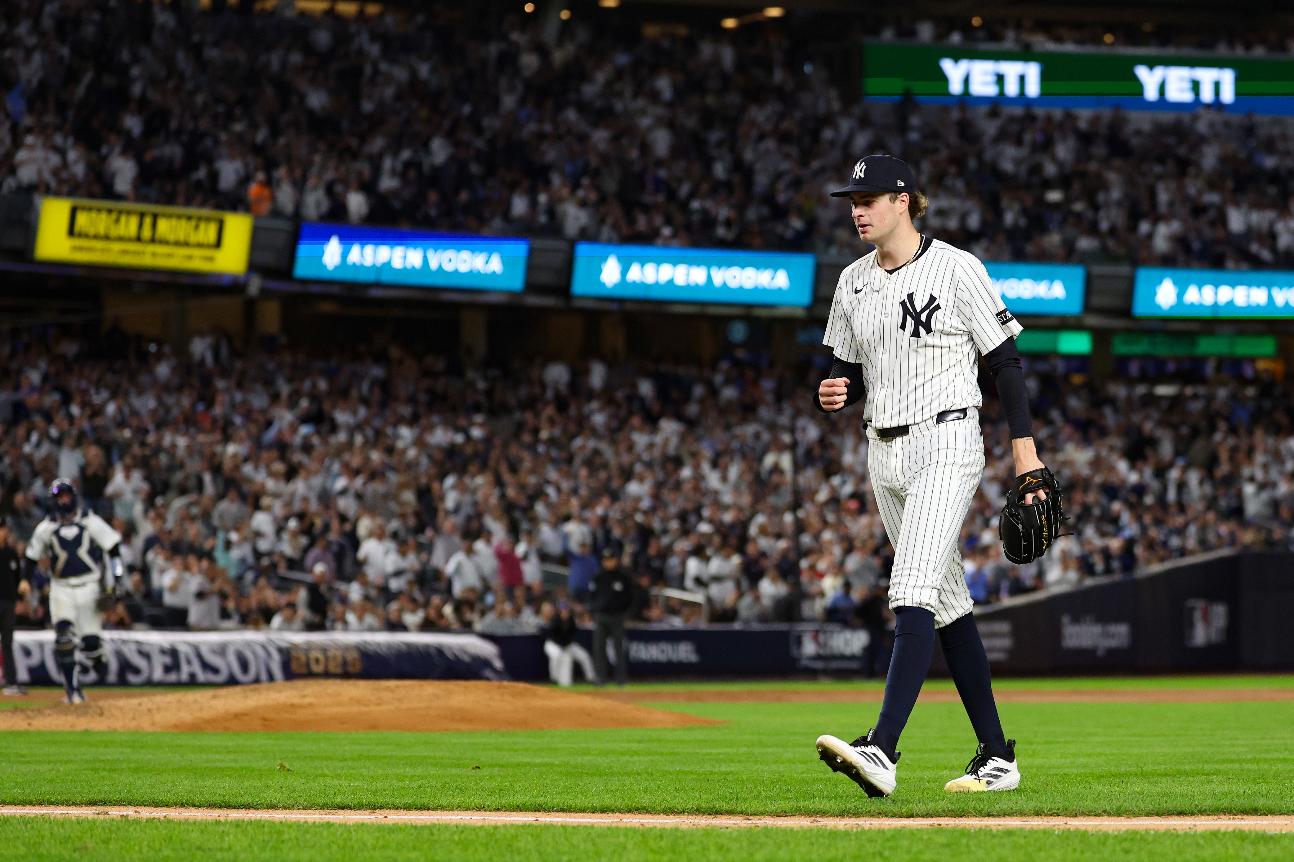 Boone describes his All-Star pitcher as being “chill. With an edge.” Schlittler loves the depiction, and he showed both sides during his remarkable outing against Boston last October, when he countered all kinds of pregame hostility by dominating in a fashion never before seen in a postseason game. “There’s no way that I was going to fold in that situation,” he says. He expects that experience to benefit him -- and the Yankees -- as this fall approaches. (Photo Credit: New York Yankees)