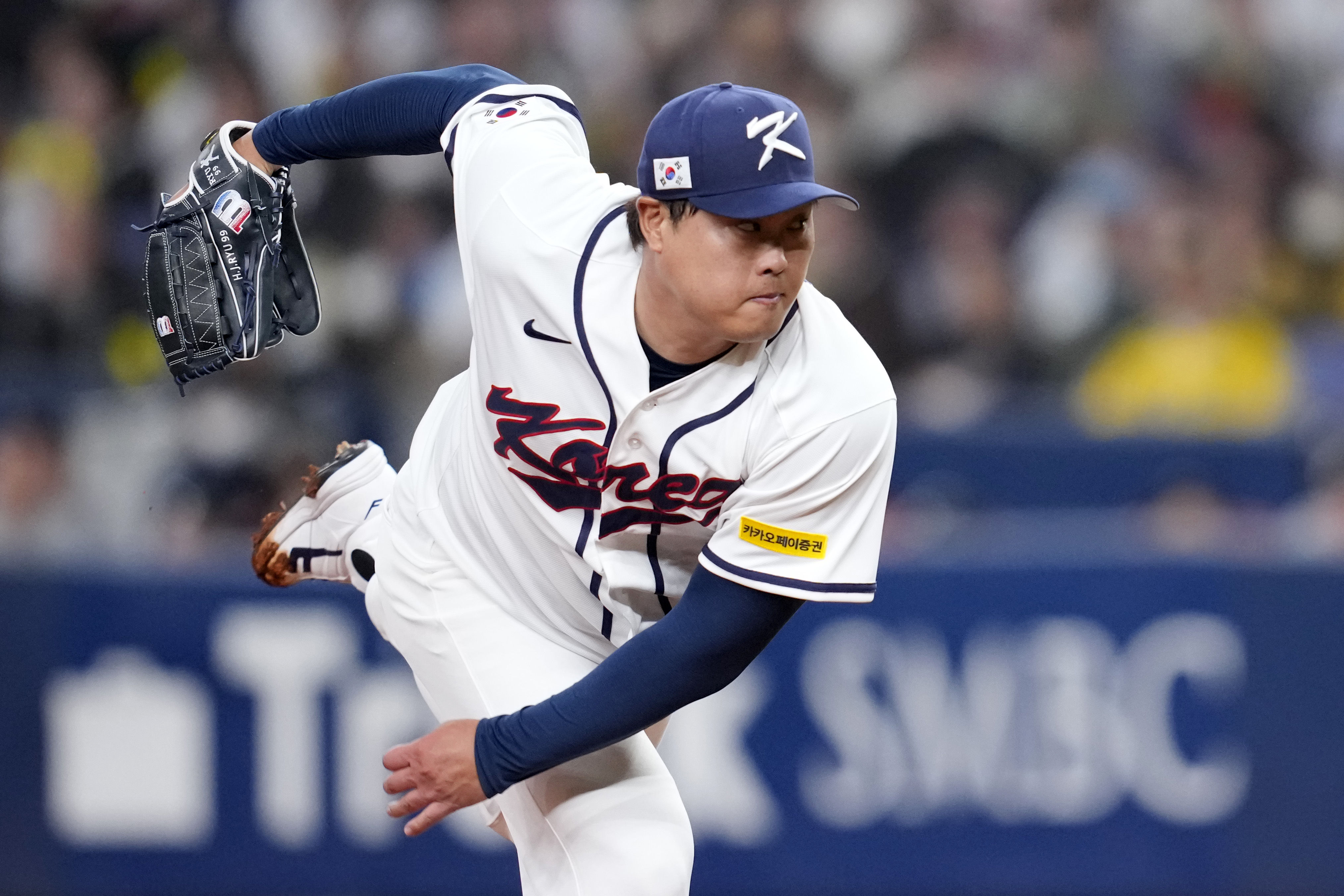 Hyun Jin Ryu pitches for Korea in a World Baseball Classic exhibition before the start of the tournament.