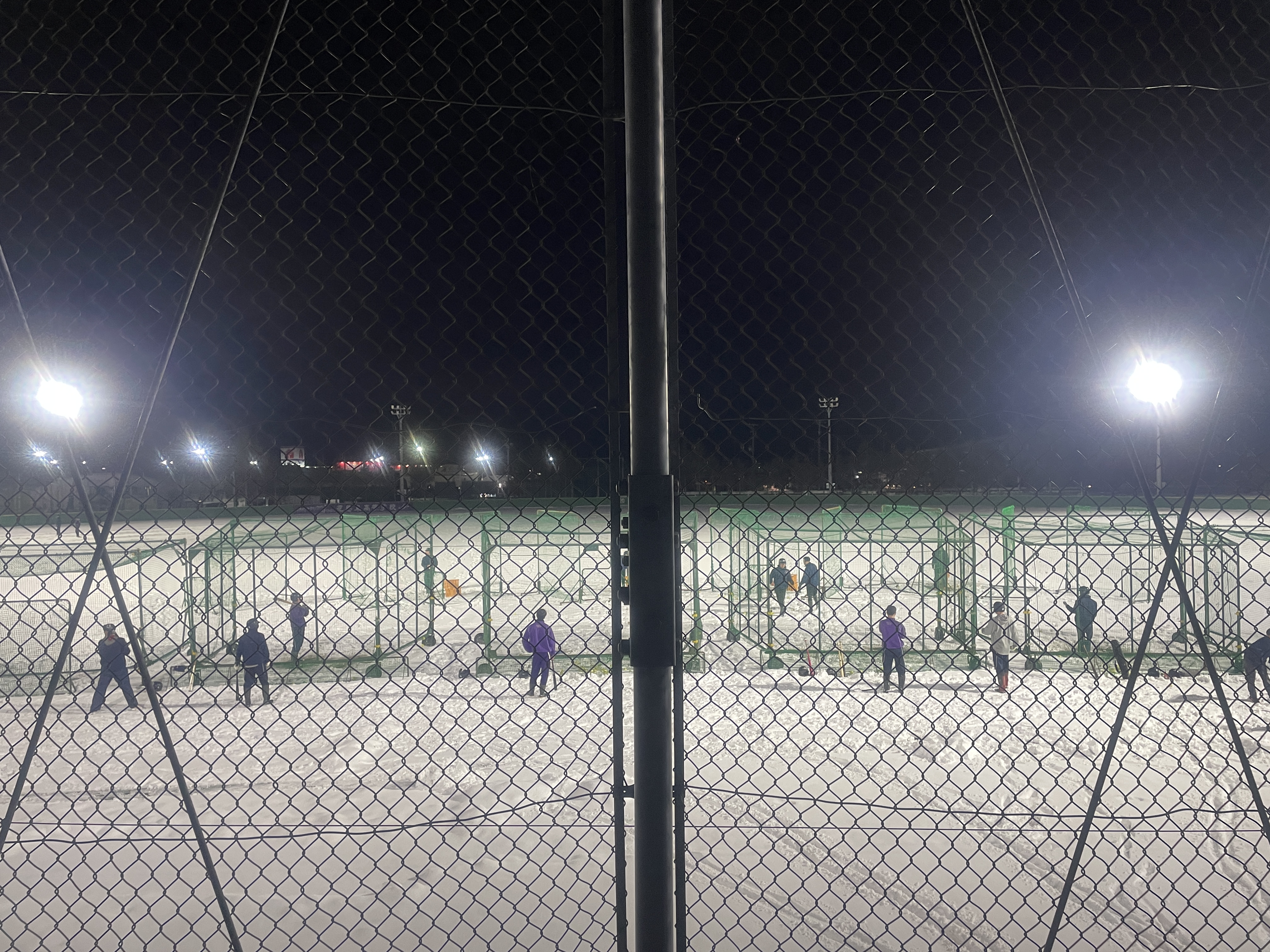 A winter workout in the batting cages at Hanamaki Higashi High School.