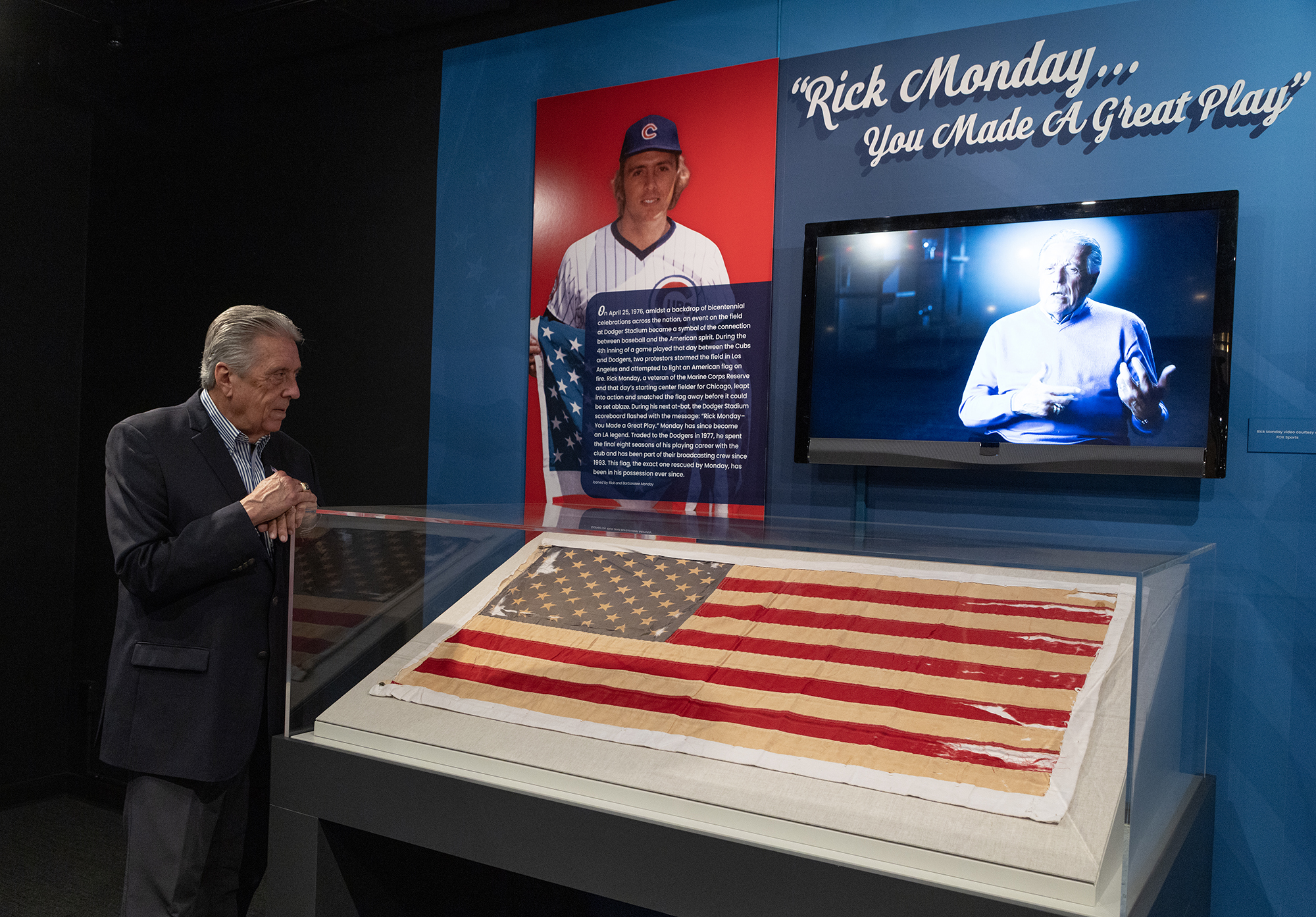 The flag that Monday saved in 1976 is on display in Cooperstown, a symbol of pride and perseverance. It is one of several artifacts that show “how the ideals in the Declaration of Independence are reflected through the lens of baseball,” said Clark. (Photo Credit: Milo Stewart Jr./National Baseball Hall of Fame and Museum)