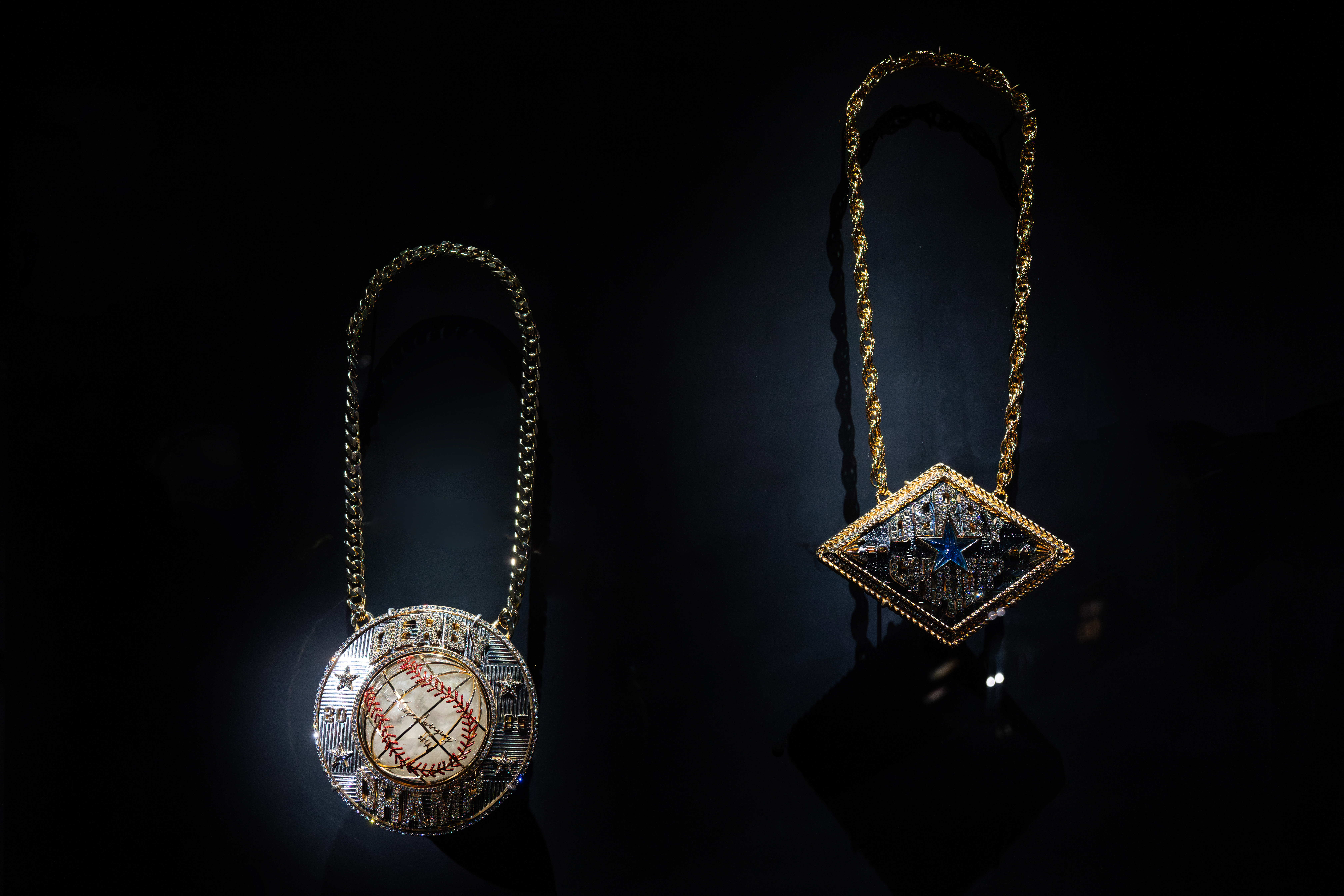 (From left to right) The 2025 and 2024 Home Run Derby chains, designed by Kenny Hwang.