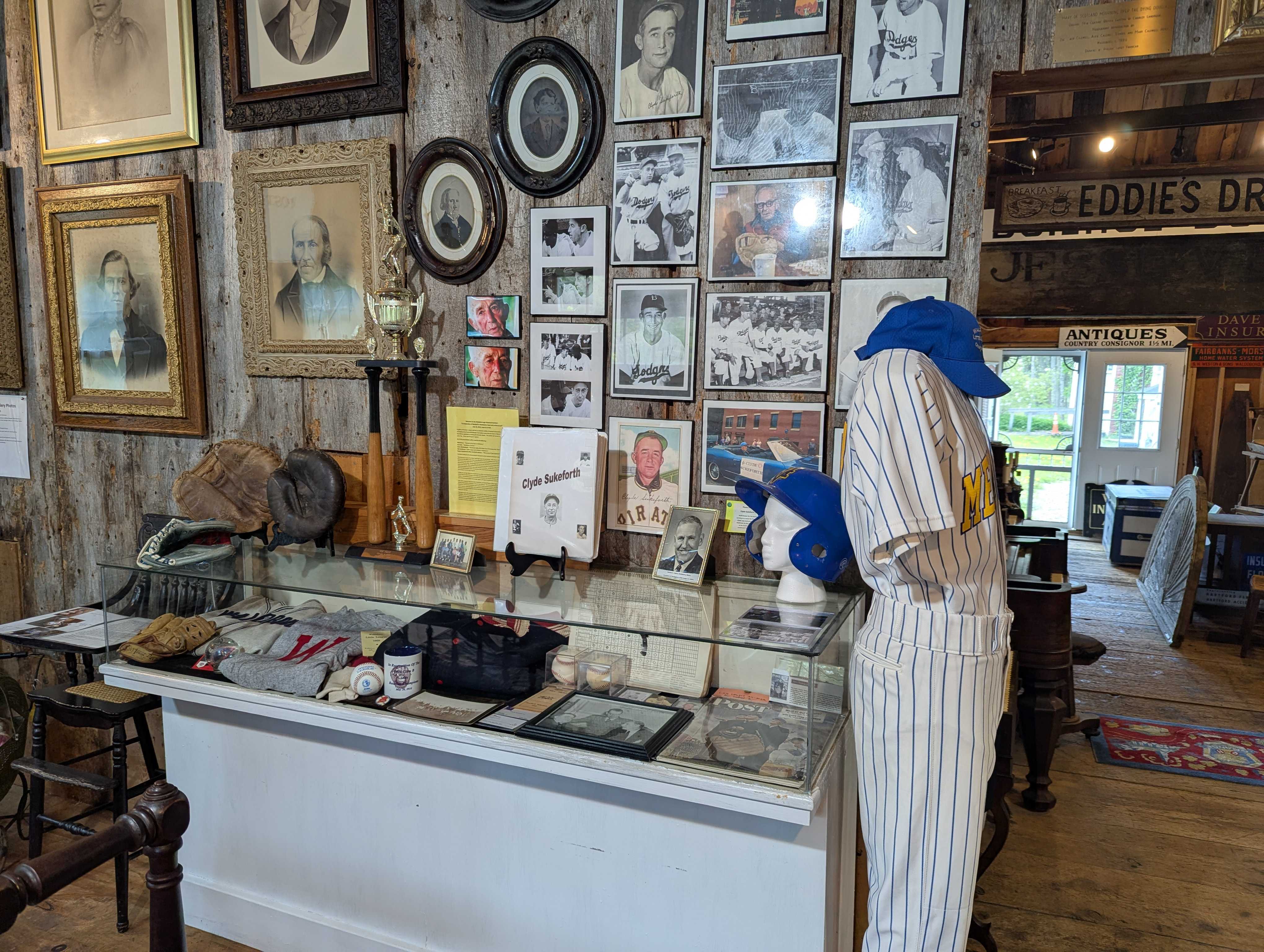 A local baseball display featuring photos, clippings and memorabilia related to Clyde Sukeforth at the Waldoboro Historical Society.