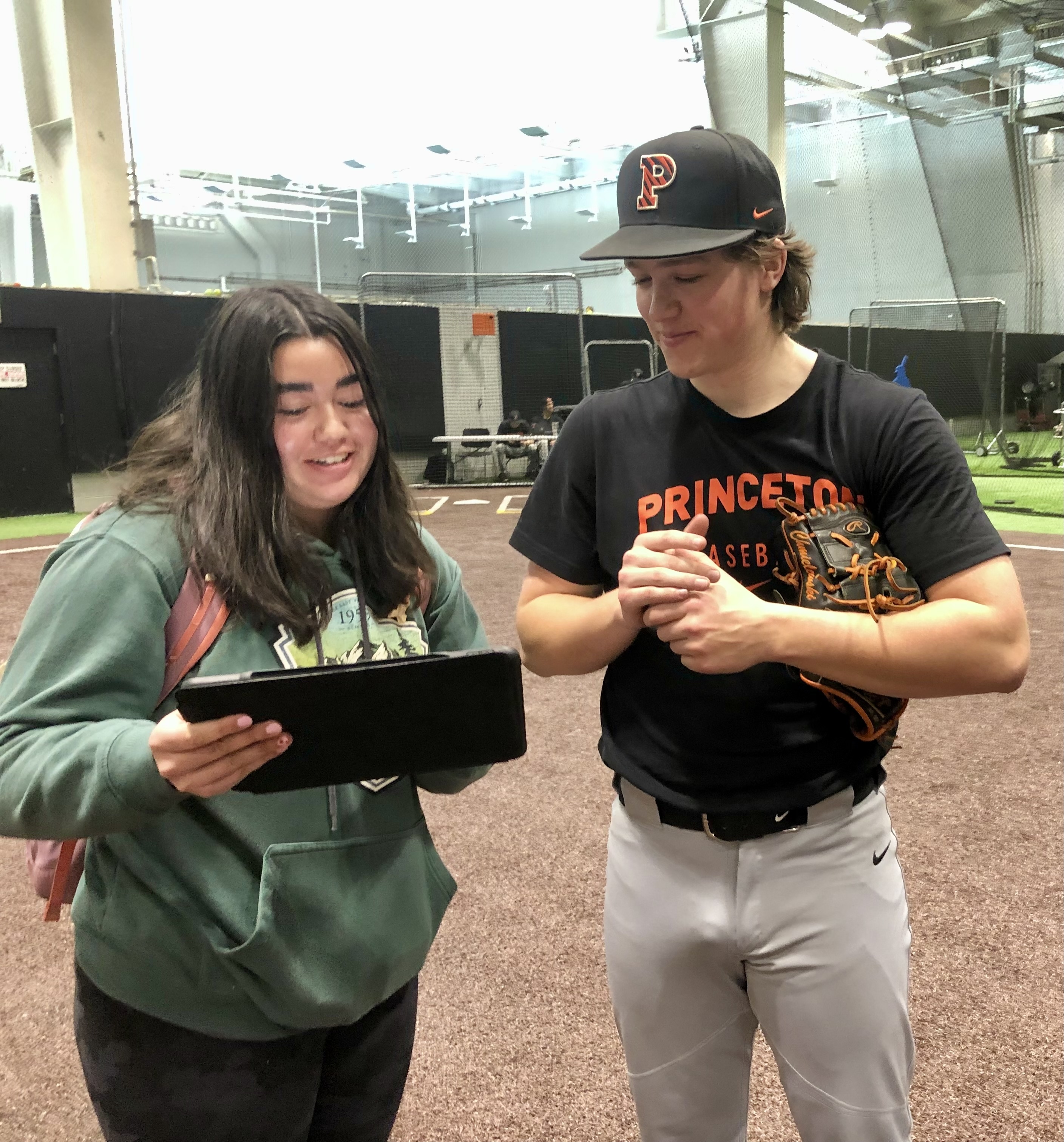 A student goes over information with one of the players. Image courtesy Adam Maloof.