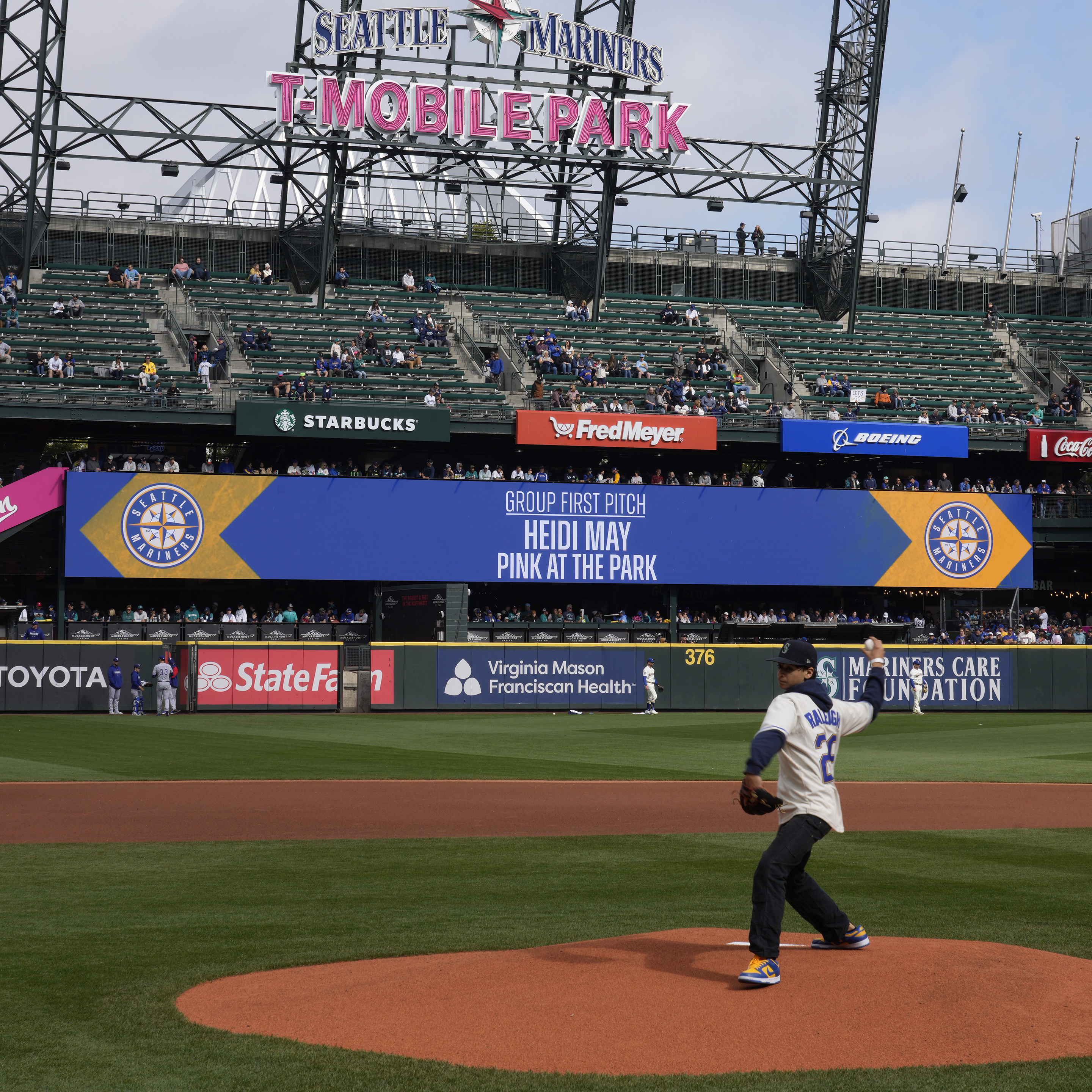 Hometown Nine member Miles Hagopian throwing out the first pitch during a 2023 Mariners game.
