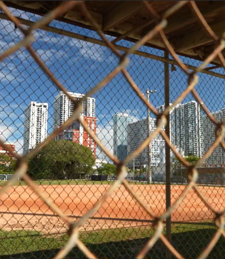 A current view through the fence of the baseball field at Dorsey Park
