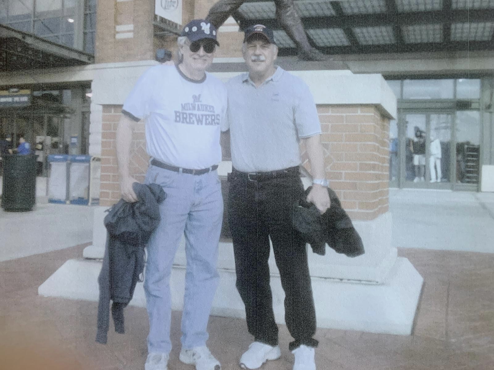 Tom Schraeder (left) and Jim Saletta at their first Brewers-Cubs game together in 2009.