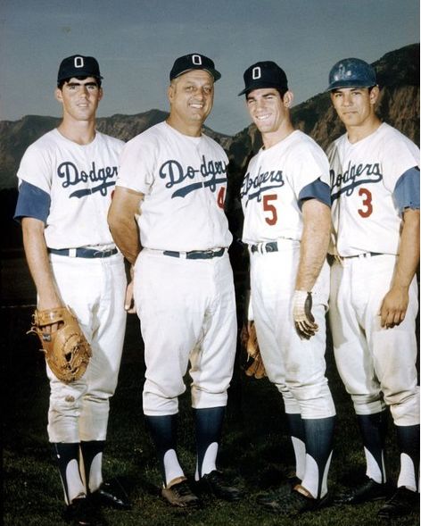 Tommy Lasorda, second from left, flanked by three players he managed on the 1968 Ogden Raptors: Bill Buckner, Steve Garvey and Bobby Valentine.