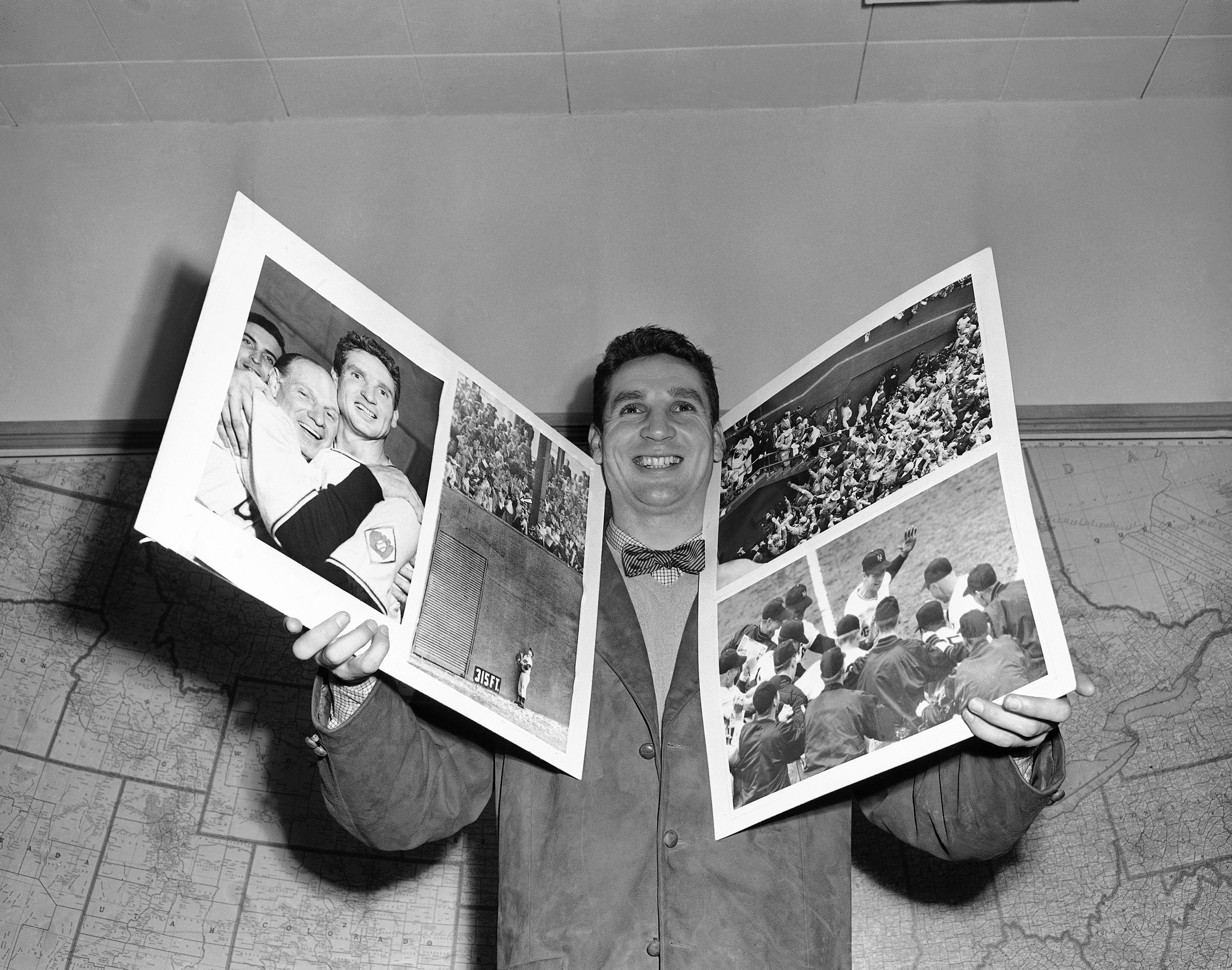 Bobby Thomson poses with photos from his iconic home run.