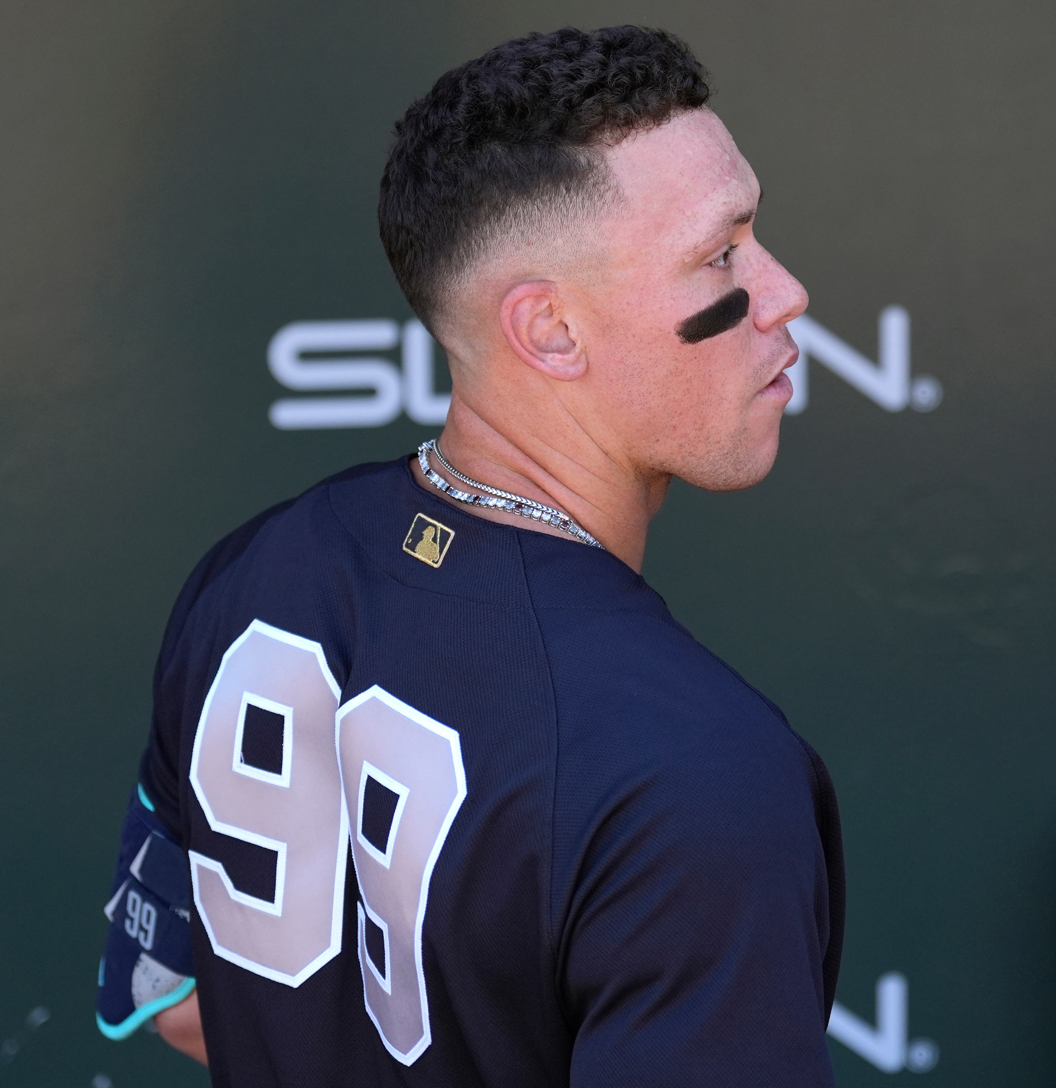 Aaron Judge wears the Yankees' navy batting practice jersey during a Spring Training game. (AP)